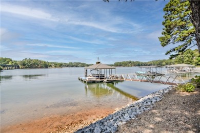 This view of the Blue Ridge Mountains and big, open water with on Keowee Key Golf and Country Club in South Carolina - for sale on GolfHomes.com, golf home, golf lot