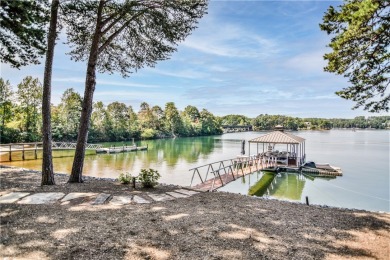 This view of the Blue Ridge Mountains and big, open water with on Keowee Key Golf and Country Club in South Carolina - for sale on GolfHomes.com, golf home, golf lot