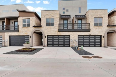 Step into this beautiful townhouse, where luxury meets charm. As on Heath Golf and Yacht Club in Texas - for sale on GolfHomes.com, golf home, golf lot