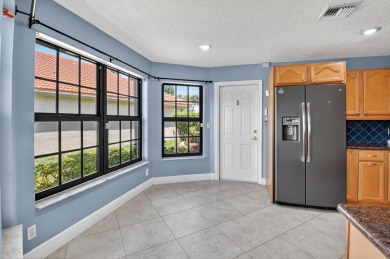 Welcome to Starlight Cove! This spacious 3 bed, 2.5 bath home on Westchester Golf and Country Club in Florida - for sale on GolfHomes.com, golf home, golf lot