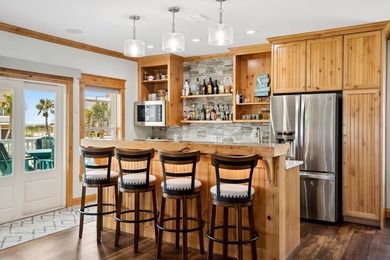 Experience the pinnacle of coastal luxury in this meticulously on Palmilla Beach Golf Club in Texas - for sale on GolfHomes.com, golf home, golf lot