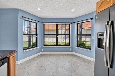Welcome to Starlight Cove! This spacious 3 bed, 2.5 bath home on Westchester Golf and Country Club in Florida - for sale on GolfHomes.com, golf home, golf lot