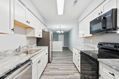 This 2nd floor 2 bedroom/2 bath condo unit in the highly on Brierwood Golf Club in North Carolina - for sale on GolfHomes.com, golf home, golf lot