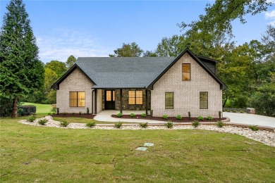 A showcase of impeccable craftsmanship, this new construction on Brookstone Meadows Golf Course in South Carolina - for sale on GolfHomes.com, golf home, golf lot