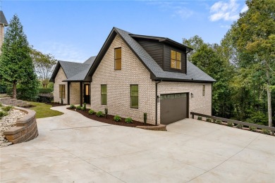 A showcase of impeccable craftsmanship, this new construction on Brookstone Meadows Golf Course in South Carolina - for sale on GolfHomes.com, golf home, golf lot