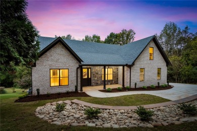A showcase of impeccable craftsmanship, this new construction on Brookstone Meadows Golf Course in South Carolina - for sale on GolfHomes.com, golf home, golf lot