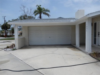 Now available in the great location of Pasadena Golf Club on Pasadena Yacht and Country Club in Florida - for sale on GolfHomes.com, golf home, golf lot