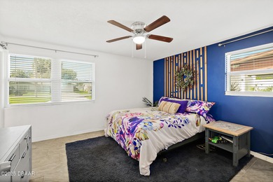 Discover the perfect blend of modern style and relaxed Florida on Daytona Beach Golf Club in Florida - for sale on GolfHomes.com, golf home, golf lot