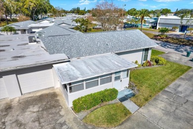 Take a peak into what resort-style living looks like in Palm on Highland Lakes Executive Golf Course in Florida - for sale on GolfHomes.com, golf home, golf lot