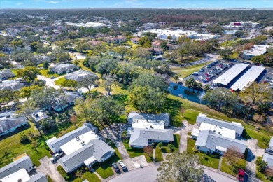 Take a peak into what resort-style living looks like in Palm on Highland Lakes Executive Golf Course in Florida - for sale on GolfHomes.com, golf home, golf lot