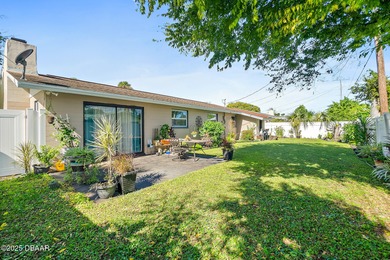 Discover the perfect blend of modern style and relaxed Florida on Daytona Beach Golf Club in Florida - for sale on GolfHomes.com, golf home, golf lot