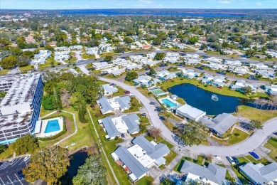 Take a peak into what resort-style living looks like in Palm on Highland Lakes Executive Golf Course in Florida - for sale on GolfHomes.com, golf home, golf lot