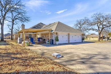 Located on a large corner lot with lake view.  This home has all on Lake Kiowa Golf Course in Texas - for sale on GolfHomes.com, golf home, golf lot