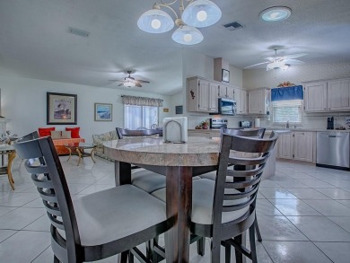 In the heart of The Villages, an exquisite retreat awaits those on El Diablo Executive Golf Course in Florida - for sale on GolfHomes.com, golf home, golf lot