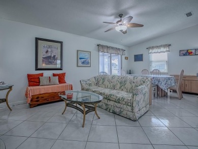 In the heart of The Villages, an exquisite retreat awaits those on El Diablo Executive Golf Course in Florida - for sale on GolfHomes.com, golf home, golf lot