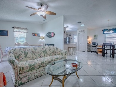 In the heart of The Villages, an exquisite retreat awaits those on El Diablo Executive Golf Course in Florida - for sale on GolfHomes.com, golf home, golf lot