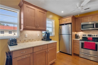 The Florida lifestyle awaits you! Vista Royale community offers on The American Golf Club in Florida - for sale on GolfHomes.com, golf home, golf lot