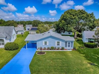 In the heart of The Villages, an exquisite retreat awaits those on El Diablo Executive Golf Course in Florida - for sale on GolfHomes.com, golf home, golf lot
