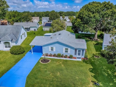 In the heart of The Villages, an exquisite retreat awaits those on El Diablo Executive Golf Course in Florida - for sale on GolfHomes.com, golf home, golf lot