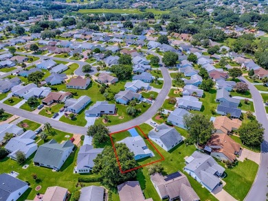 In the heart of The Villages, an exquisite retreat awaits those on El Diablo Executive Golf Course in Florida - for sale on GolfHomes.com, golf home, golf lot