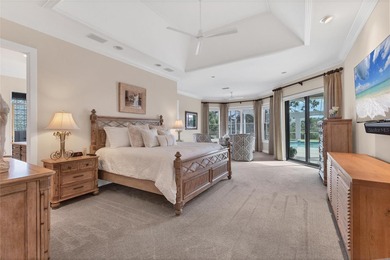 This beautiful custom designed home will captivate you from the on The Oaks Club in Florida - for sale on GolfHomes.com, golf home, golf lot