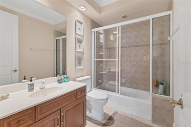 This beautiful custom designed home will captivate you from the on The Oaks Club in Florida - for sale on GolfHomes.com, golf home, golf lot