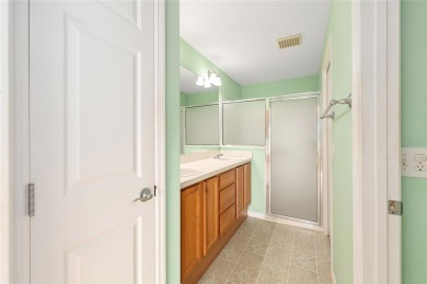 Charming, Block  Stucco, Courtyard Villa on a Corner Lot in on The Links of Spruce Creek in Florida - for sale on GolfHomes.com, golf home, golf lot