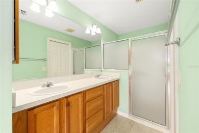 Charming, Block  Stucco, Courtyard Villa on a Corner Lot in on The Links of Spruce Creek in Florida - for sale on GolfHomes.com, golf home, golf lot