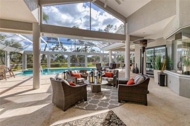This beautiful custom designed home will captivate you from the on The Oaks Club in Florida - for sale on GolfHomes.com, golf home, golf lot