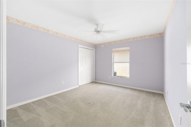 Charming, Block  Stucco, Courtyard Villa on a Corner Lot in on The Links of Spruce Creek in Florida - for sale on GolfHomes.com, golf home, golf lot