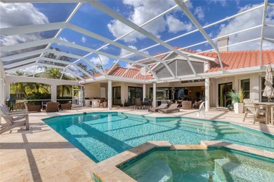 This beautiful custom designed home will captivate you from the on The Oaks Club in Florida - for sale on GolfHomes.com, golf home, golf lot