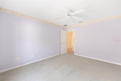 Charming, Block  Stucco, Courtyard Villa on a Corner Lot in on The Links of Spruce Creek in Florida - for sale on GolfHomes.com, golf home, golf lot