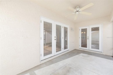 Charming, Block  Stucco, Courtyard Villa on a Corner Lot in on The Links of Spruce Creek in Florida - for sale on GolfHomes.com, golf home, golf lot
