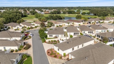 Charming, Block  Stucco, Courtyard Villa on a Corner Lot in on The Links of Spruce Creek in Florida - for sale on GolfHomes.com, golf home, golf lot