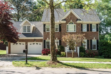 This exceptional property on a private wooded lot in the heart on Devils Ridge Golf Club in North Carolina - for sale on GolfHomes.com, golf home, golf lot