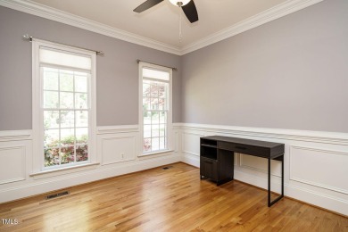This exceptional property on a private wooded lot in the heart on Devils Ridge Golf Club in North Carolina - for sale on GolfHomes.com, golf home, golf lot