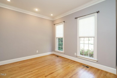 This exceptional property on a private wooded lot in the heart on Devils Ridge Golf Club in North Carolina - for sale on GolfHomes.com, golf home, golf lot