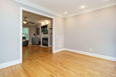 This exceptional property on a private wooded lot in the heart on Devils Ridge Golf Club in North Carolina - for sale on GolfHomes.com, golf home, golf lot