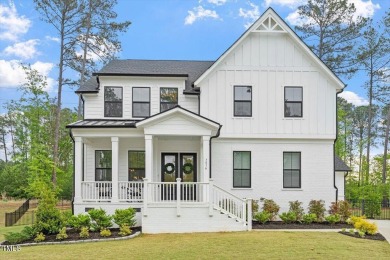 Nestled in the prestigious and sought-after Hasentree, lies the on Hasentree Club in North Carolina - for sale on GolfHomes.com, golf home, golf lot