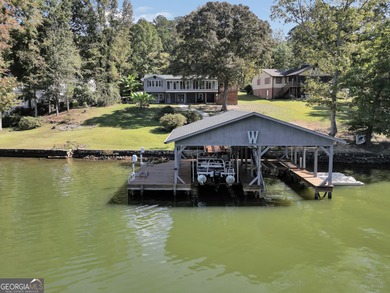 Lakefront Living in Turtle Cove! Welcome to this stunning on Turtle Cove Golf Course in Georgia - for sale on GolfHomes.com, golf home, golf lot