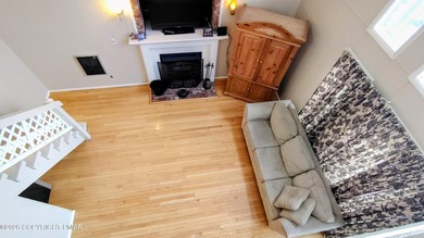 Escape to this cute-as-a-button 3-bedroom, 1-bath chalet with a on The Hideout Golf in Pennsylvania - for sale on GolfHomes.com, golf home, golf lot