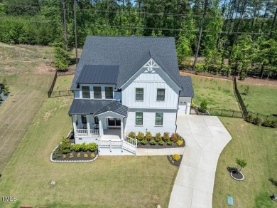 Nestled in the prestigious and sought-after Hasentree, lies the on Hasentree Club in North Carolina - for sale on GolfHomes.com, golf home, golf lot