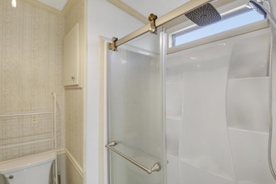 Oversized corner lot 2BR/2BA in the Cambridge section of on Heritage Ridge Golf Club in Florida - for sale on GolfHomes.com, golf home, golf lot