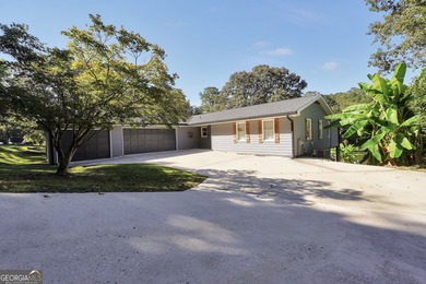 Lakefront Living in Turtle Cove! Welcome to this stunning on Turtle Cove Golf Course in Georgia - for sale on GolfHomes.com, golf home, golf lot