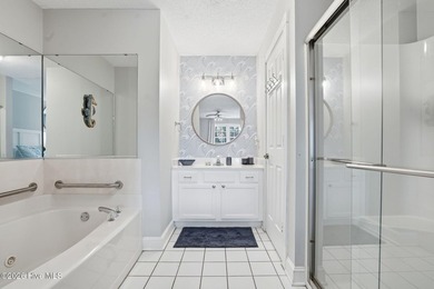 Embrace the essence of coastal living in this beautifully on Oyster Bay Golf Links in North Carolina - for sale on GolfHomes.com, golf home, golf lot