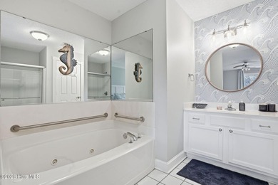 Embrace the essence of coastal living in this beautifully on Oyster Bay Golf Links in North Carolina - for sale on GolfHomes.com, golf home, golf lot