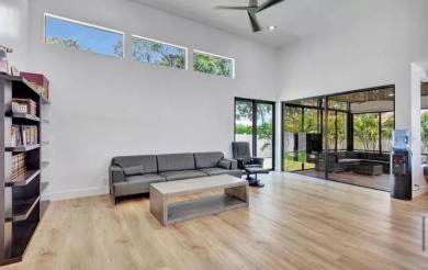 This fully renovated contemporary estate is nestled in the on Broken Sound Golf and Club  in Florida - for sale on GolfHomes.com, golf home, golf lot