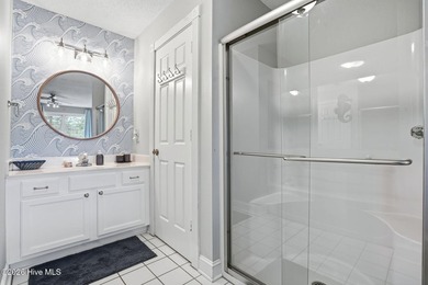 Embrace the essence of coastal living in this beautifully on Oyster Bay Golf Links in North Carolina - for sale on GolfHomes.com, golf home, golf lot