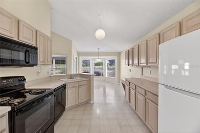 Located in Sun City Center, Florida's #1 retirement community on Caloosa Greens Executive Golf Course in Florida - for sale on GolfHomes.com, golf home, golf lot