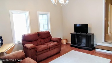 Escape to this cute-as-a-button 3-bedroom, 1-bath chalet with a on The Hideout Golf in Pennsylvania - for sale on GolfHomes.com, golf home, golf lot